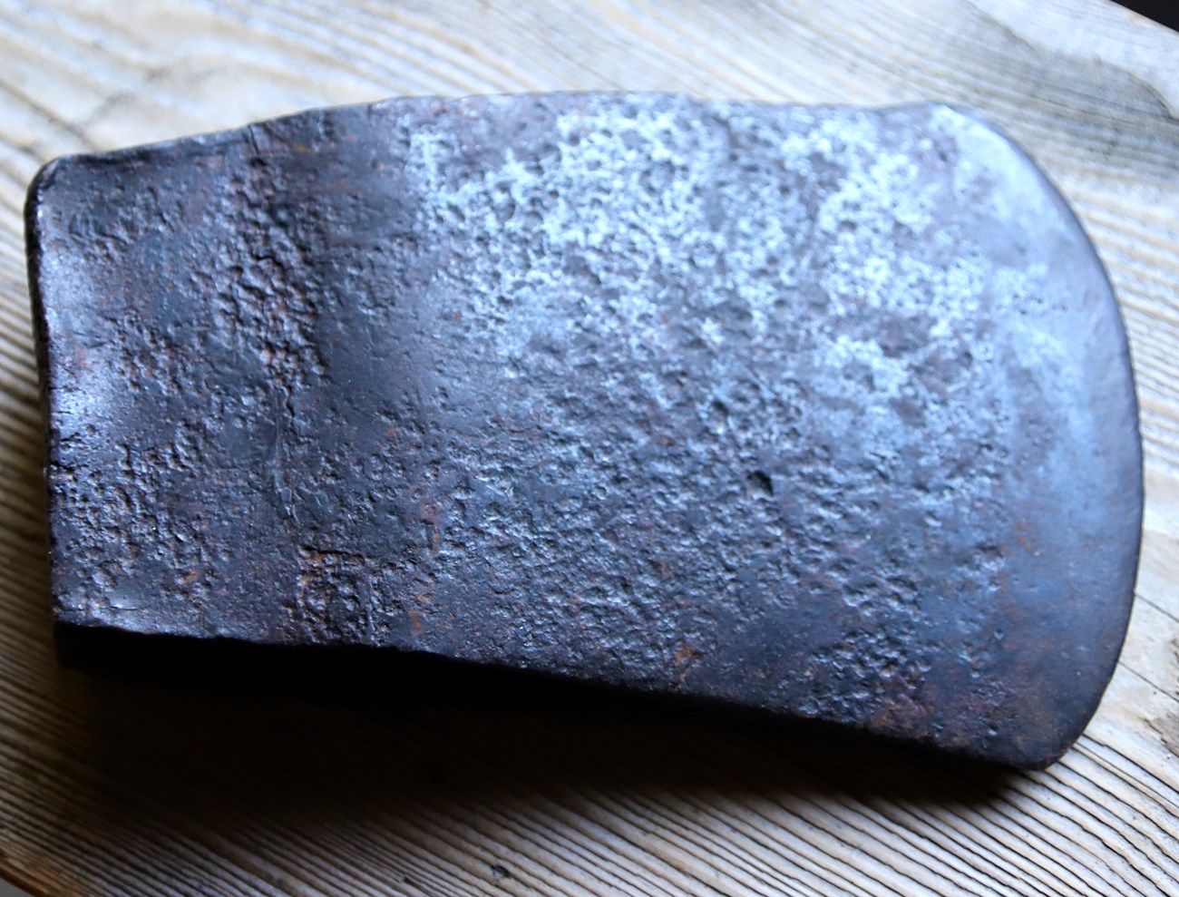 Old hand- forged axe head