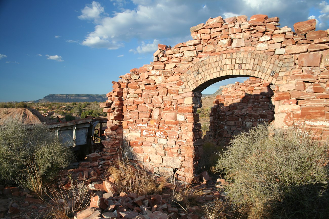 LAKE Grand Gulch Mine ruins of stone and brick building in the desert