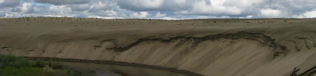 Kobuk Valley Sand Dunes Cloudy skies and brown sand dunes of Kobuk Valley