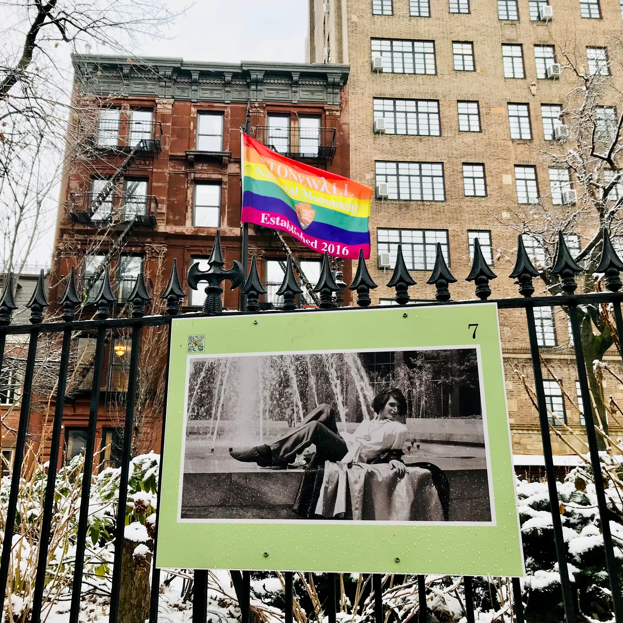 Lgbt Community Gay Club with Rainbow Flag on the Facade of a Brick