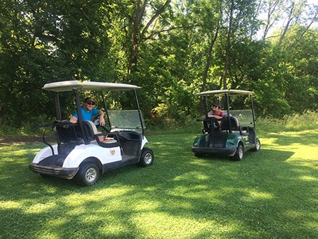 University of Pennsylvania graduate students conduct fieldwork using golf carts Two University of Pennsylvania graduate students conduct fieldwork using golf carts at East Potomac Park
