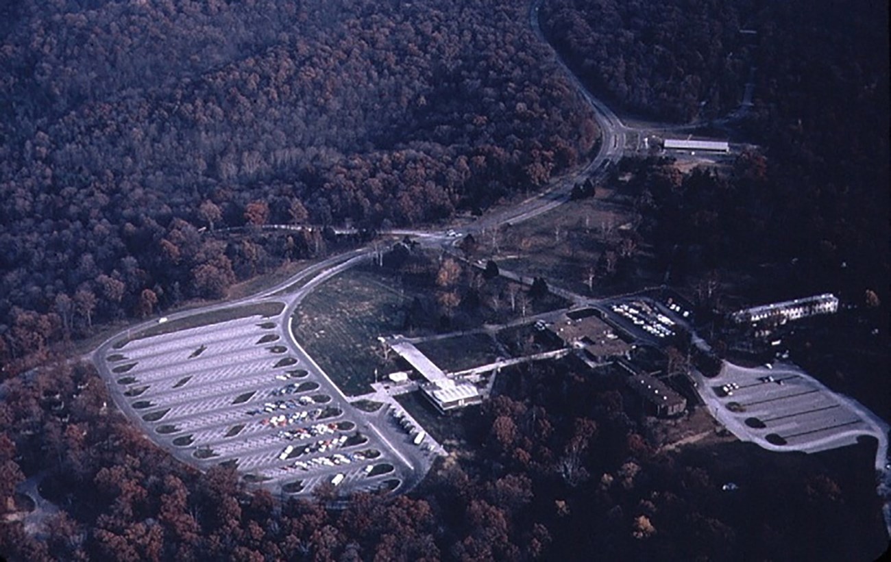 Aerial viewof visitor center complex showing layout of the roads, parking, and visitor facilities.