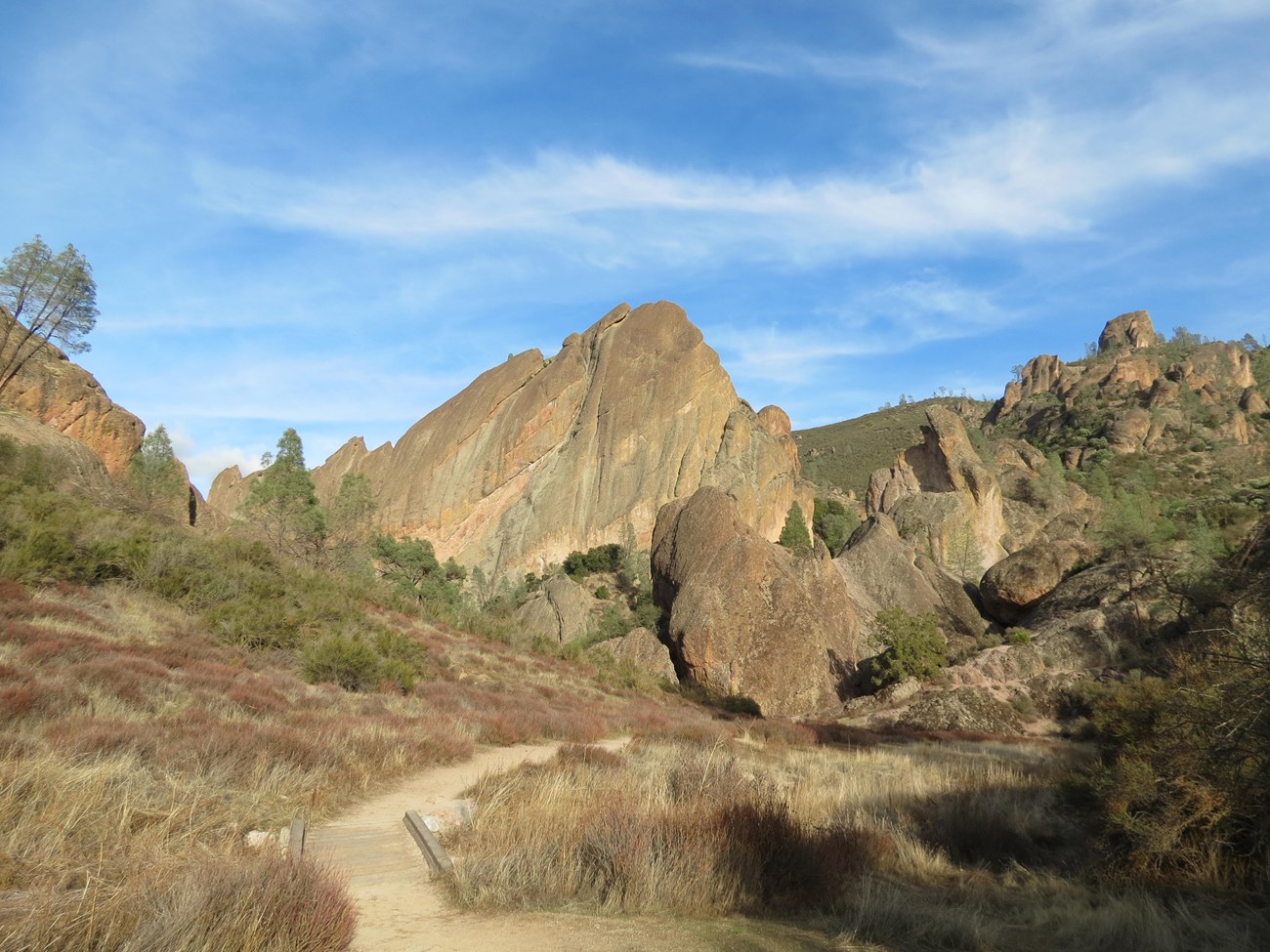 PINN landscape trail winding through rock outcrops