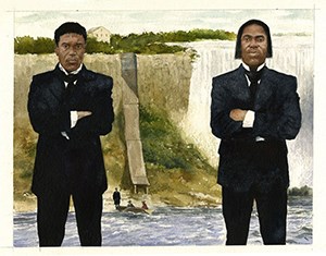 Two men in suits stand in front of the Niagara Falls.
