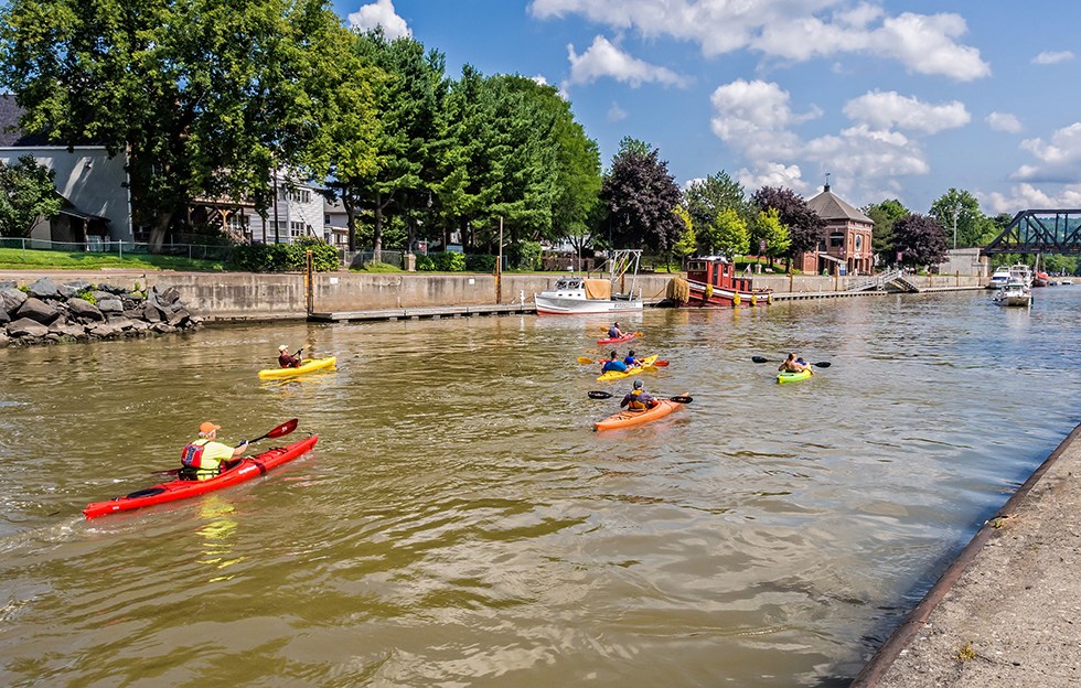 Kayaks and their paddlers on the Erie Canal near Waterford, NY