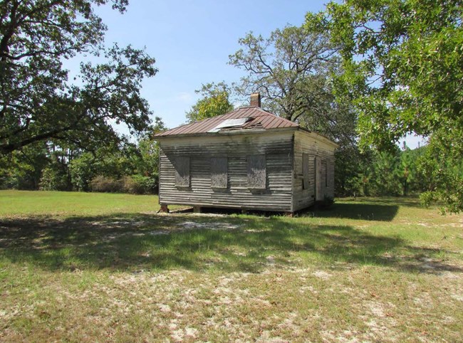 Boarded up wooden one-room schoolhouse