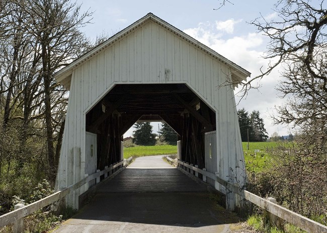 White wooden covered bridge