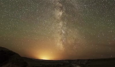 lt= Sky glow from light pollution is visible on the horizon, and impacts night sky viewsheds.