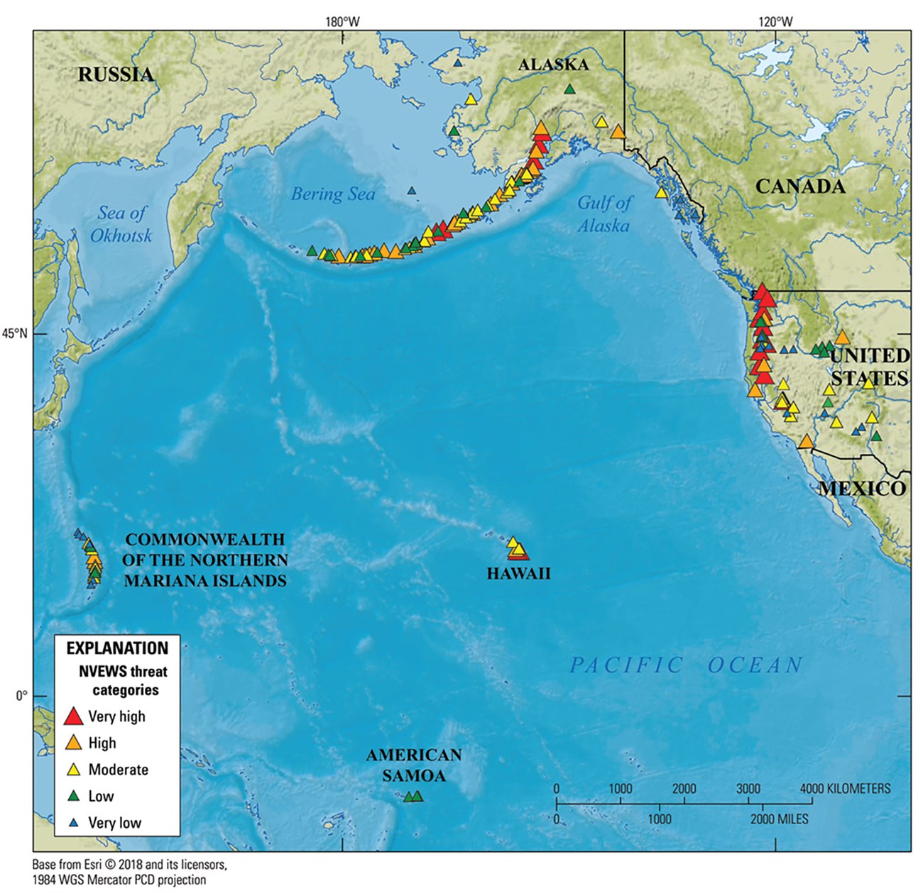 Map of pacific rim volcanoes with symbols for volcanic threat level.