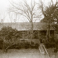 single story house with porch across the front