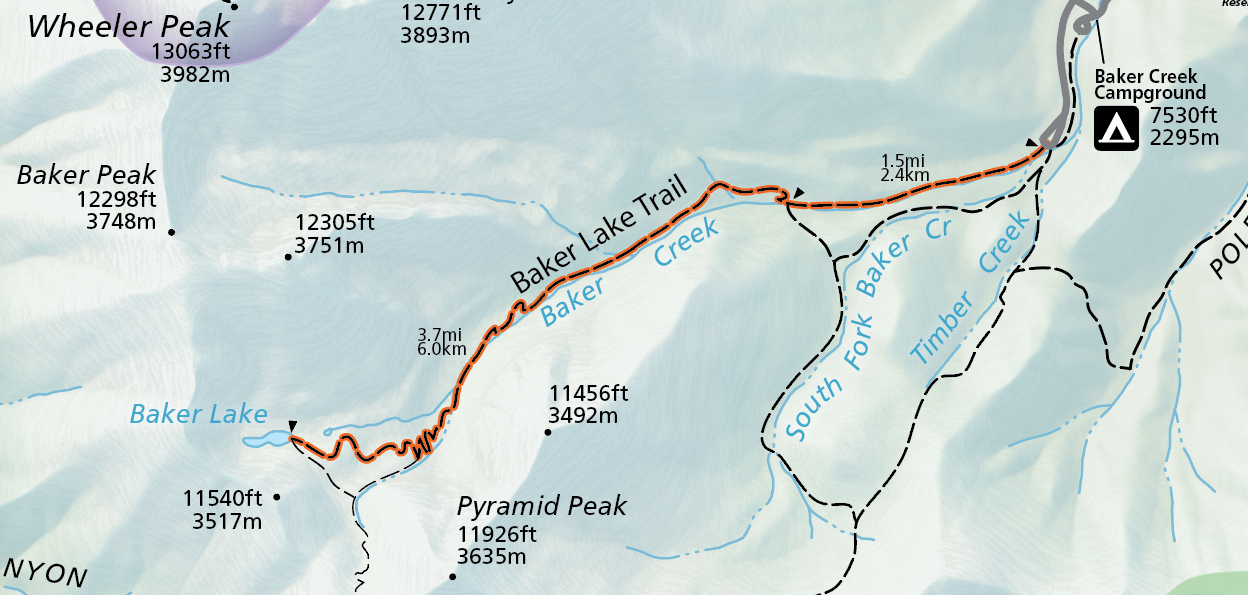 A color image of a selection of the official park map. A grey road emerges from the top and connects to an orange highlighted trail labeled "Baker Lake Trail." The trail ends with a small blue lake  labeled "Baker Lake"