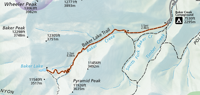 Baker Lake Trail via Baker Creek Highlight A color image of a selection of the official park map. A grey road emerges from the top and connects to an orange highlighted trail labeled "Baker Lake Trail." The trail ends with a small blue lake  labeled "Baker Lake"