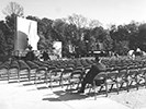 A man waits for Roosevelt's statue to be unveiled