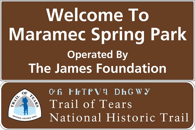 Brown sign, "welcome to Maramac Spring Park Operated by the James Foundation"