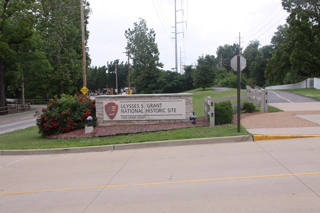 entrance sign 6-13 with trail