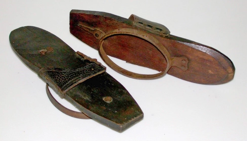 Pattens artifact, wood, leather, metal