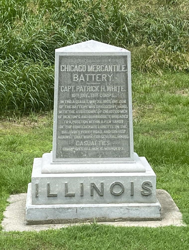 square Stone Monument with "Illinois" written on its base.