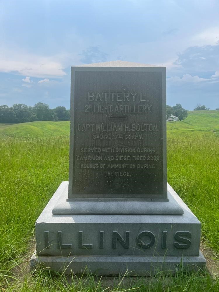 Square Rectangular stone monument with ILLINOIS written on its base