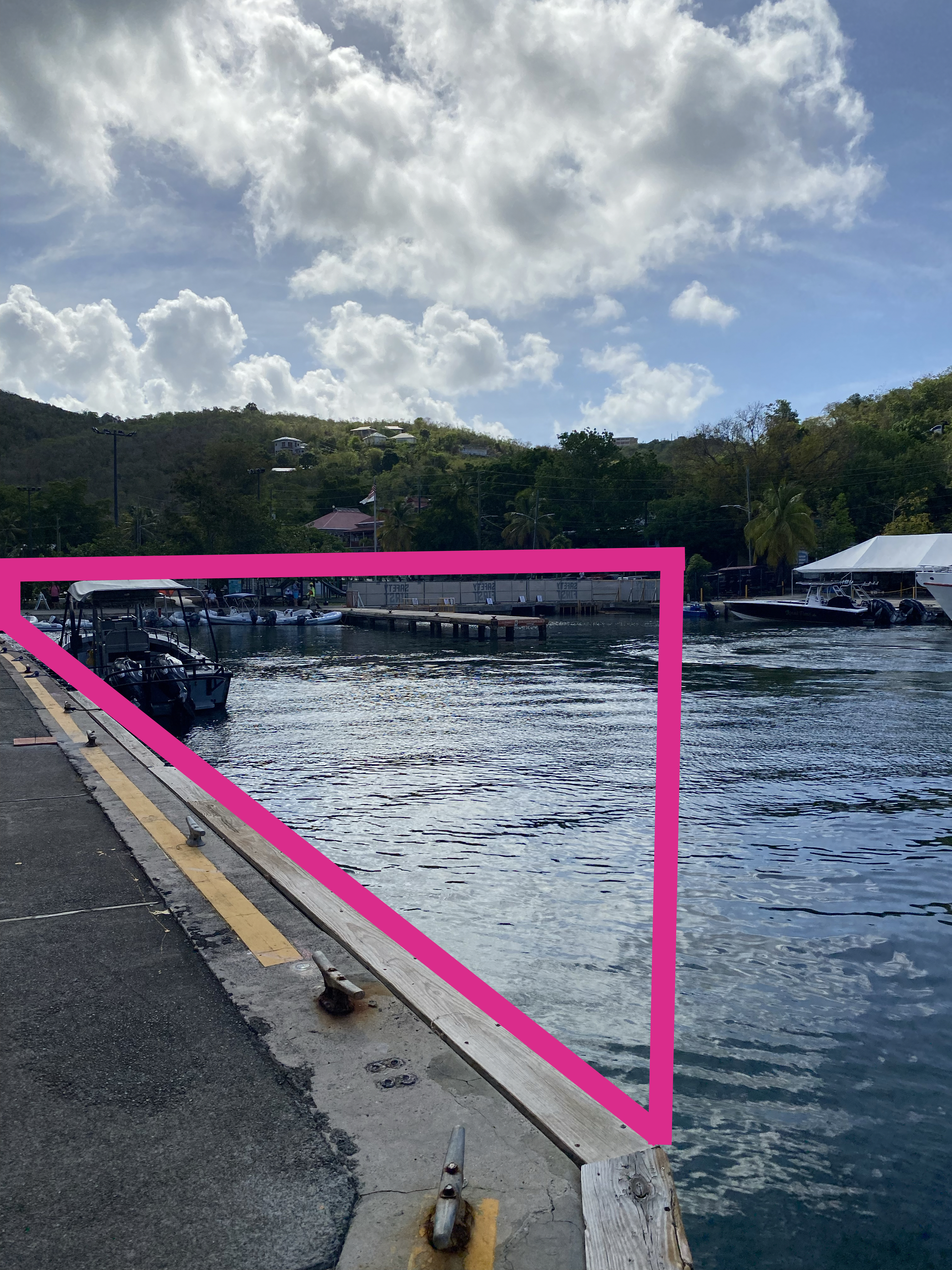 The NPS bulkhead and finger pier in Cruz Bay Creek are shown with drawn lines outlining the area to be closed by a turbidity boom.