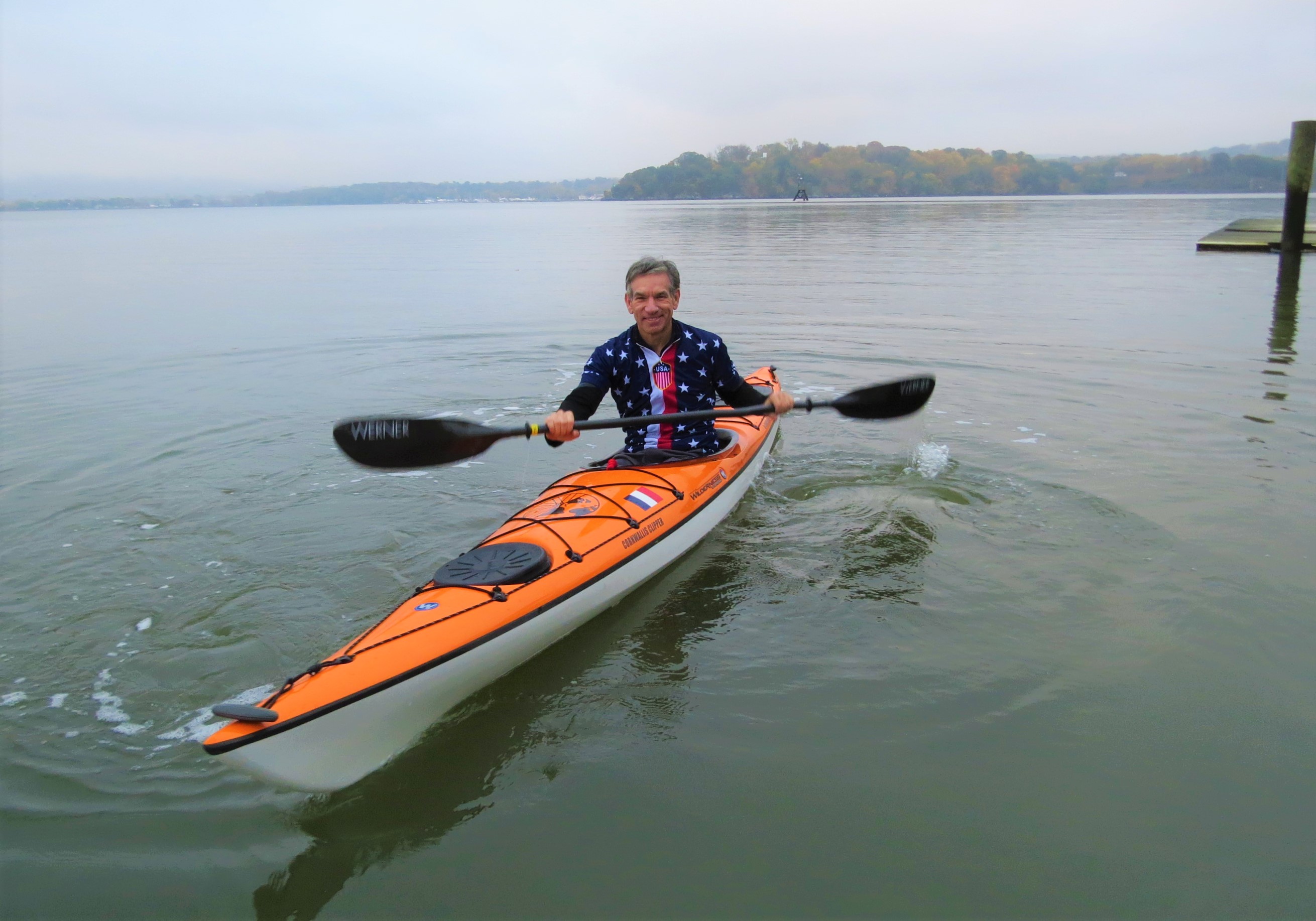 a man floats in a kayak