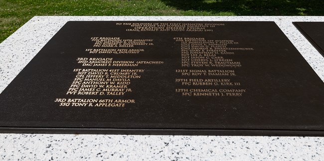 WHHO_Monuments_20250515_KGraczyk_001_crop A bronze plaque lists the names of soldiers by unit.