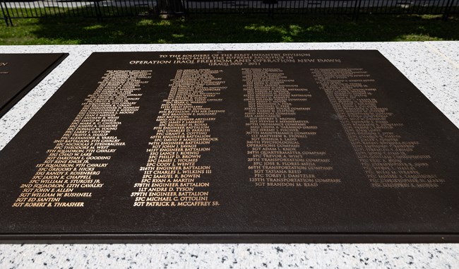 WHHO_Monuments_20250515_KGraczyk_004_crop A bronze plaque with many names on it.