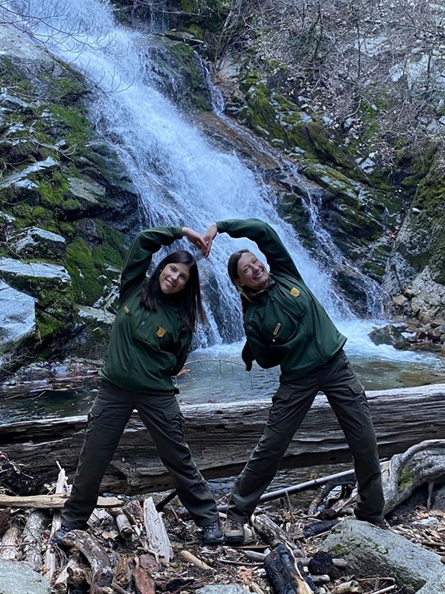 Showing their love and excitement for the reopening of Whiskey town Falls on Valentine's Day 2020, park staff create a heart shape with their bodies.