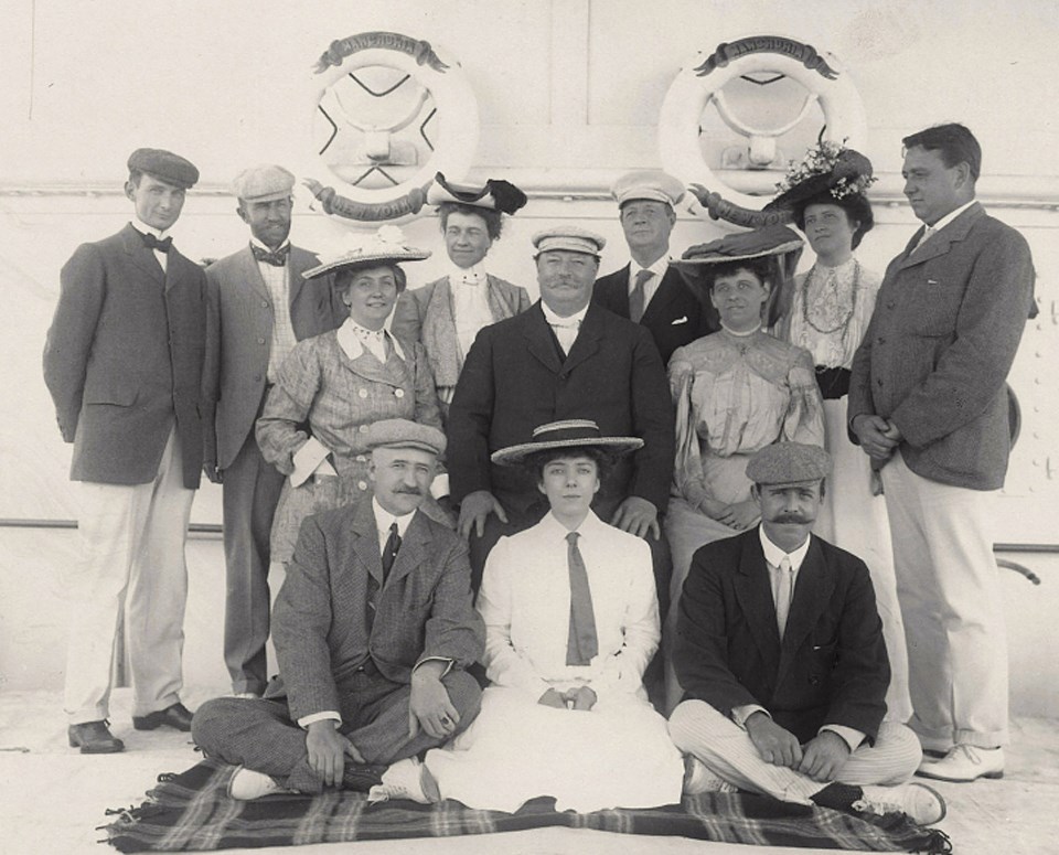 Several members of the Taft delegation posing for a photo aboard a ship