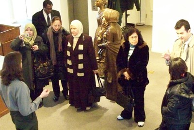 Superintendent Tina Orcutt talks about the 1848 Women's Rights Convention with a delegation of Iraqi women.