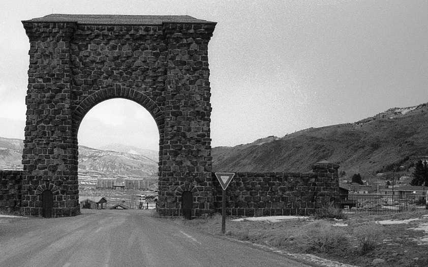 Yellowstone's Heritage & Research Center as seen through the Roosevelt Arch, photo by Elise Fariello, 2015.