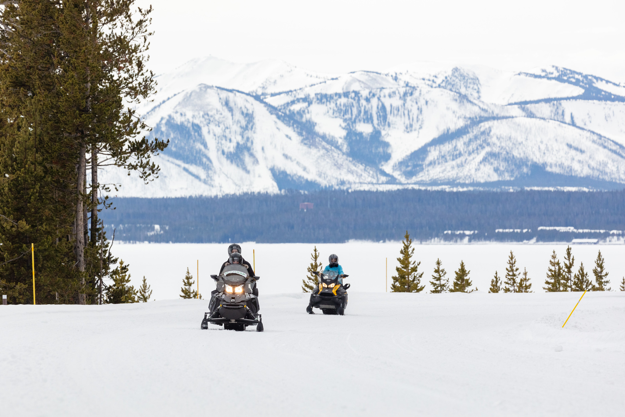 Snowmobilers along Yellowstone Lake