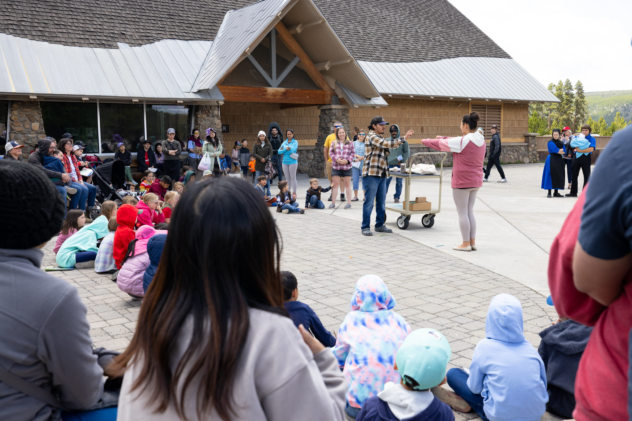 Tribal games junior ranger program: Artists Joseph and Rachel Pichardo demonstrate pebble in hand