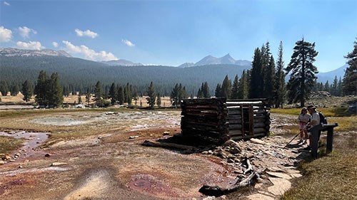 Soda Springs in early fall with two people hiking