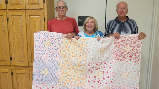 Donors with their donated quilt