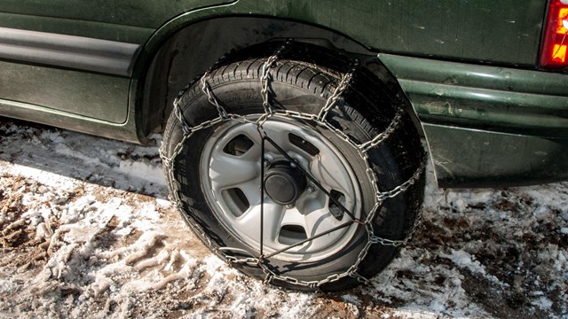 Car tire with tire chains on
